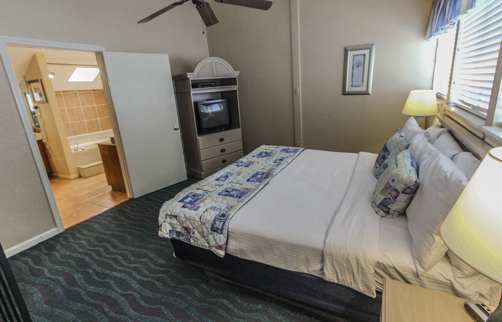 A comfy master bedroom at VRI's The Landing at Seven Coves in Willis, Texas.